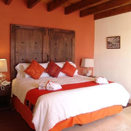 Casa Del Tio Hotel Boutique San Miguel de Allende Ruang foto A bedroom at Hotel San Cristóbal