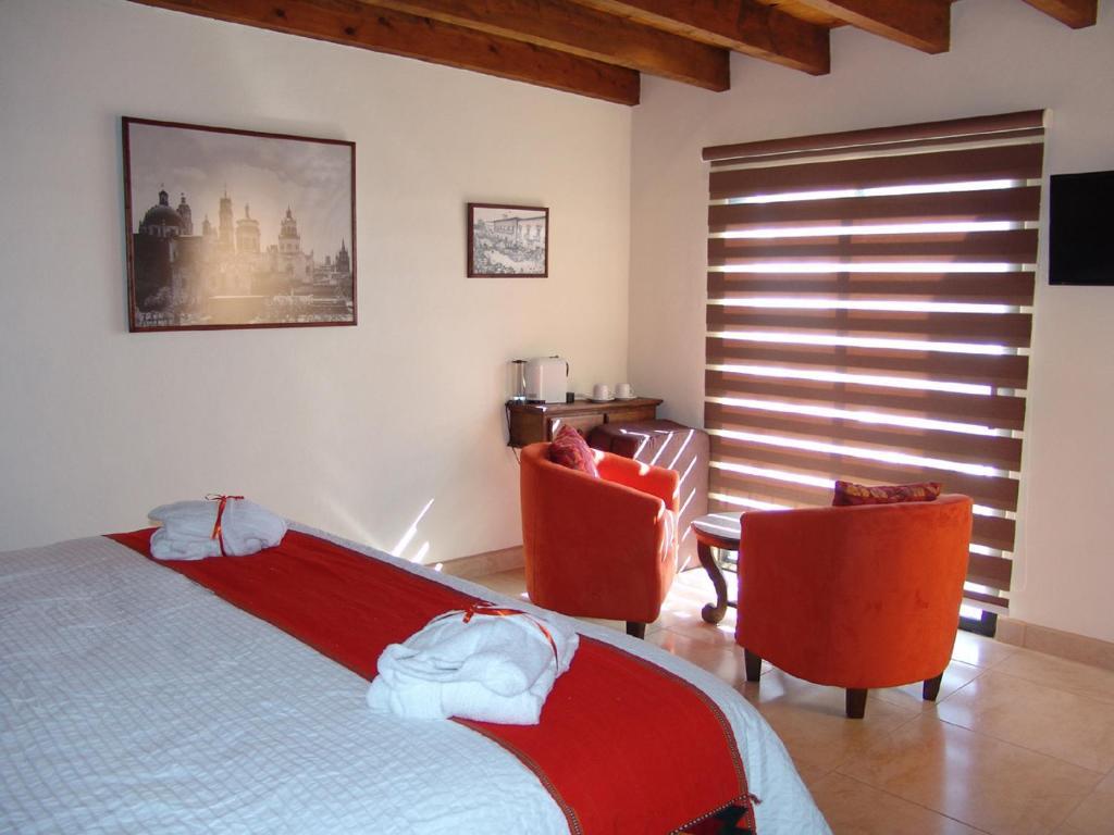 Casa Del Tio Hotel Boutique San Miguel de Allende Ruang foto A room at the hotel