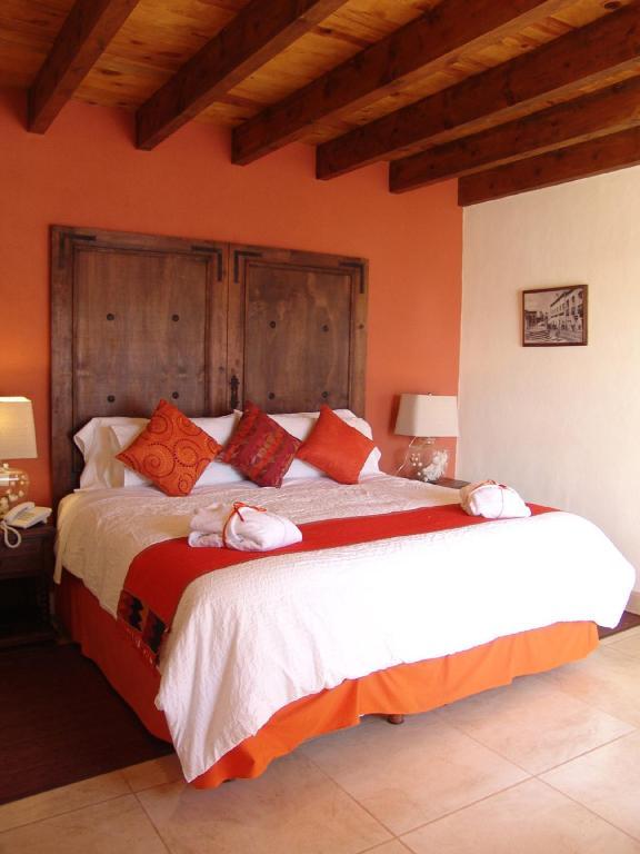 Casa Del Tio Hotel Boutique San Miguel de Allende Ruang foto A bedroom at Hotel San Cristóbal