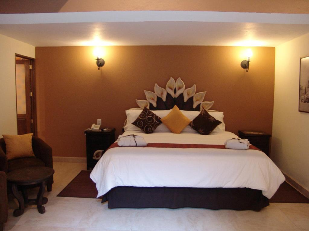 Casa Del Tio Hotel Boutique San Miguel de Allende Ruang foto A room at the hotel