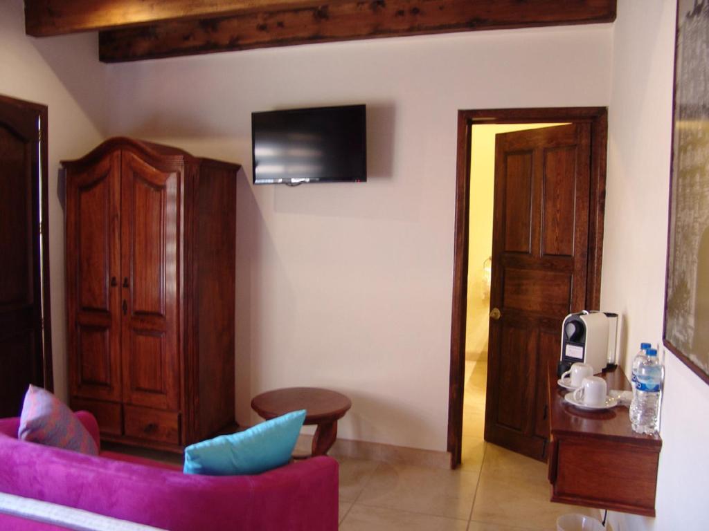 Casa Del Tio Hotel Boutique San Miguel de Allende Ruang foto A room at the hotel