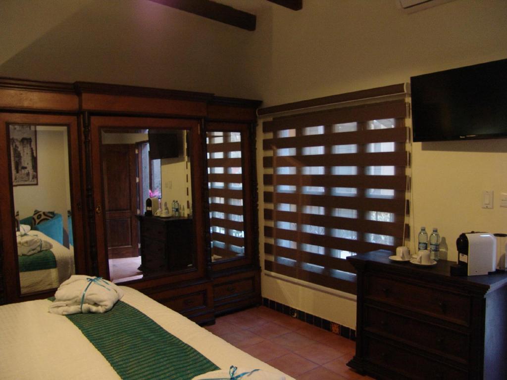 Casa Del Tio Hotel Boutique San Miguel de Allende Ruang foto A room at the resort