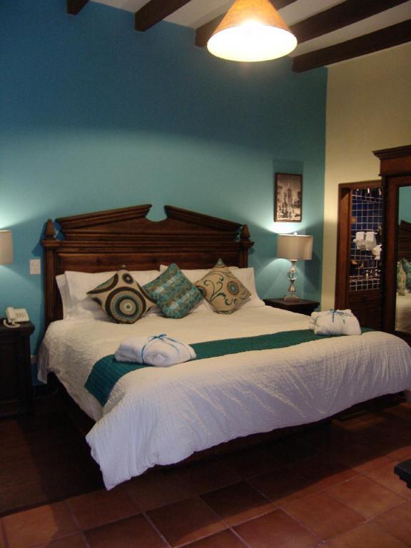 Casa Del Tio Hotel Boutique San Miguel de Allende Ruang foto A bedroom at Hotel San Angel Inn